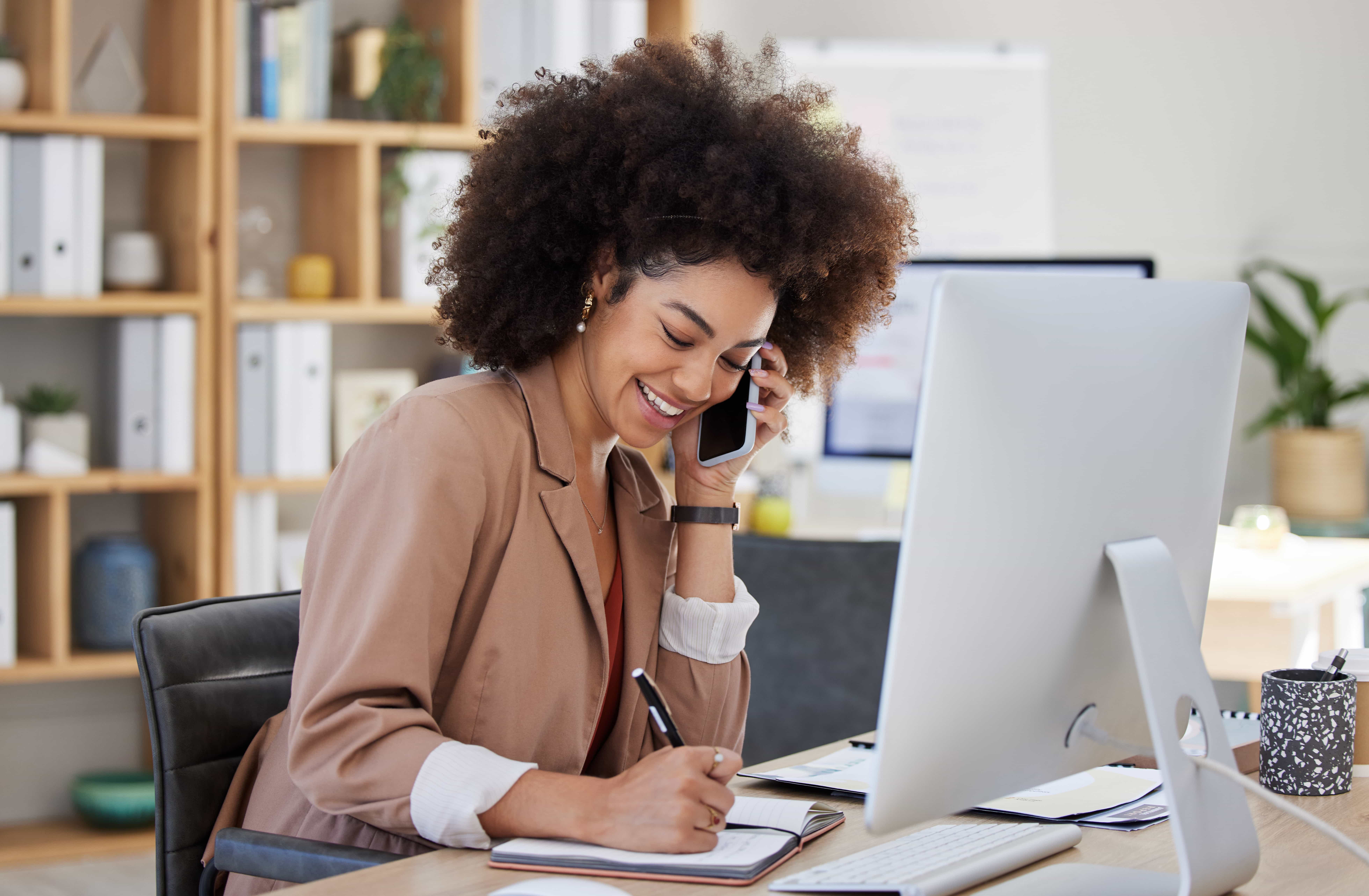 phone call or business woman writing report ideas_590508695-min